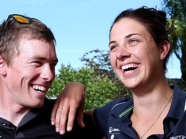 CYCLING - Rohan Dennis with his girlfriend Melissa Hoskins, who rides for GreenEDGE and his new BMC bike and jersey. Photo Sarah Reed