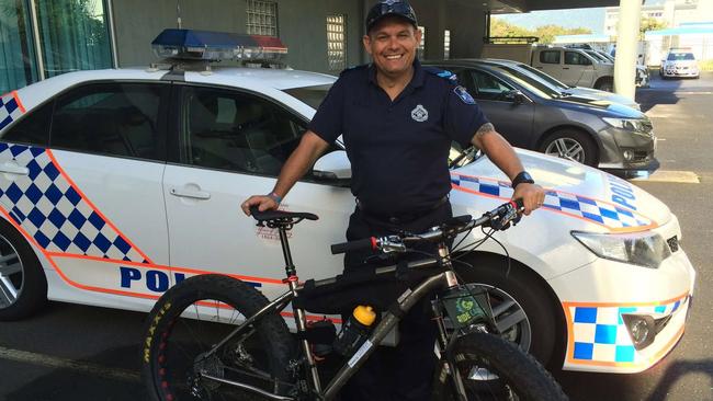 Frank Falappi holding his 'fatbike' in preparation for training. Picture: QPS