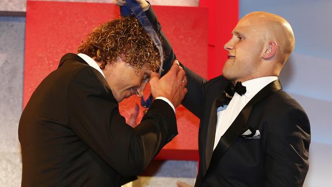 Gary Ablett bestows the Brownlow Medal on Matt Priddis. Picture: Michael Klein