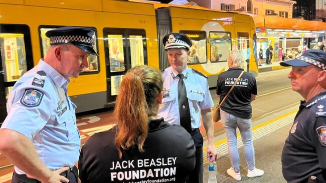 Police and Jack Beasley Foundation volunteers at a wanding trial in Surfers Paradise.