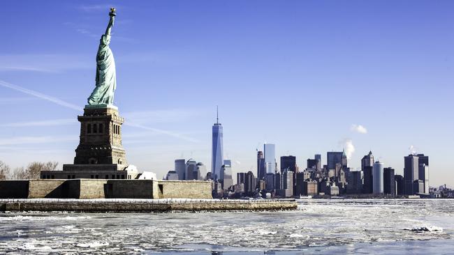 New York City, NY, USA - February 24, 2015: View of Statue of Liberty and tip of Manhattan. Weather phenomenon known as Polar Vortex / Siberian Express arrives from the arctic and freezes the Hudson River. Chunks of ice sheets form and flow on the Hudson river. View of Statue of Liberty, One World Trade Center and Battery Park City. Downtown NYC. Photo: iStockEscape 2 March 2025Why I Travel