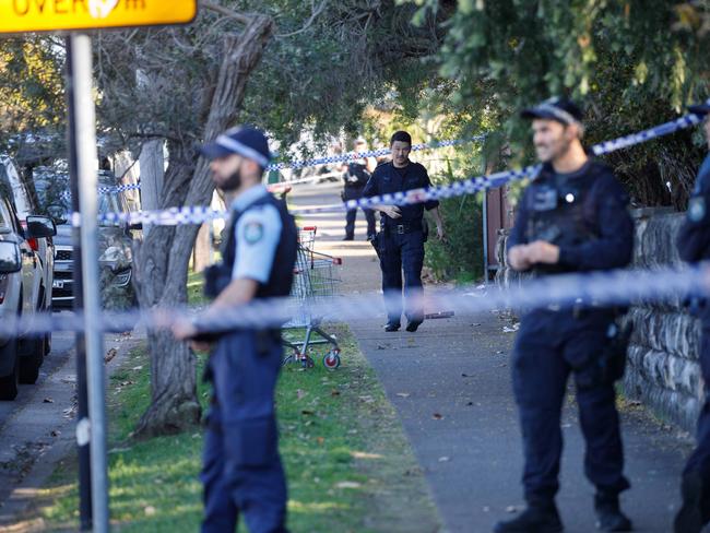 Police at the scene of a fatal gangland shooting on Harold St, Parramatta, on Monday. Picture: Max Mason-Hubers