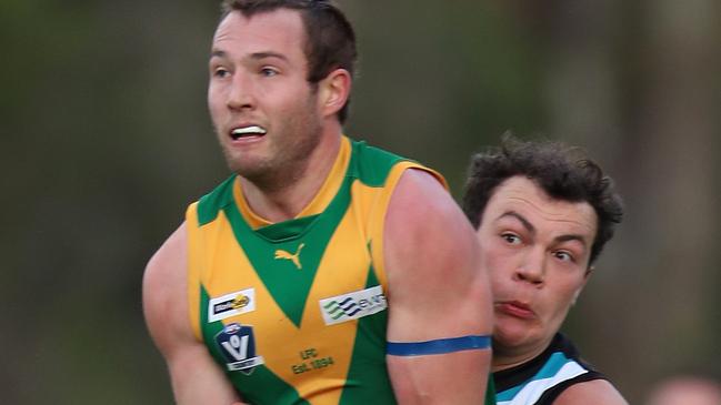 Wonthaggi’s Brodie Mabilia tackles Leongatha’s Thomas Marriott. Picture Yuri Kouzmin