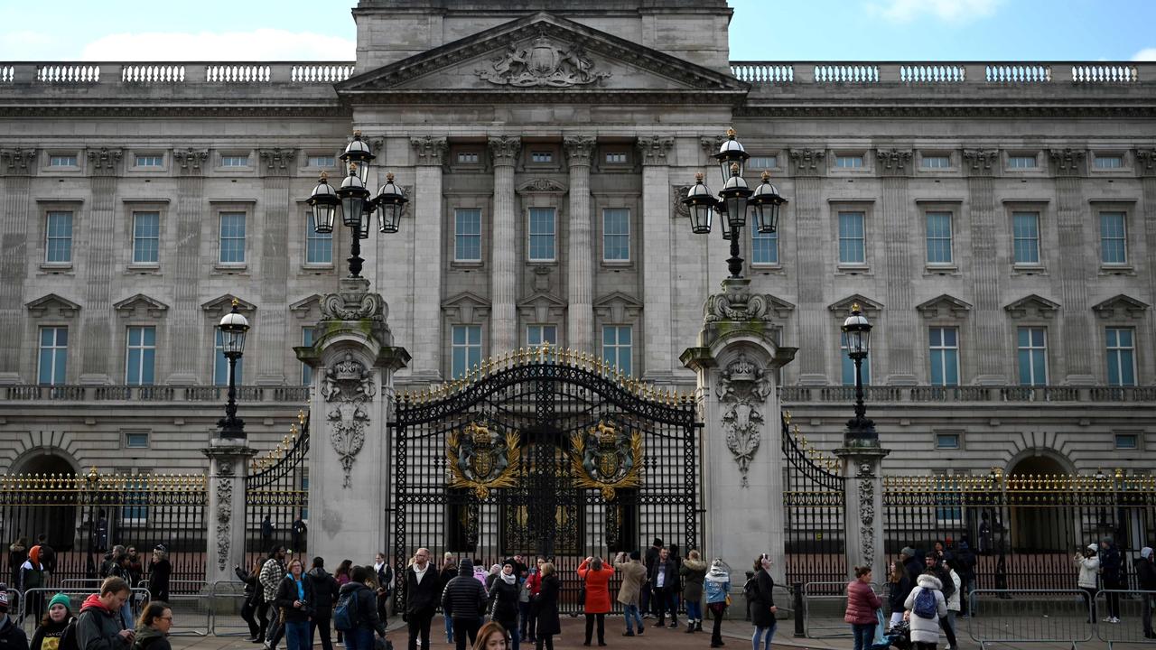 Tourists gathering outside Buckingham Palace last month. Picture: Daniel Leal-Olivas/AFP