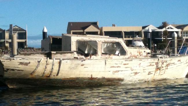 The demasted yacht at the North Haven marina before it sustained serious damage. Picture: Steve Reynolds