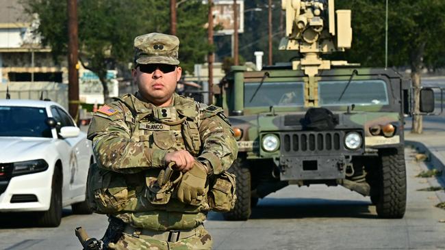 A National Guard soldier mans a roadblock in Altadena, California during the Eaton Fire. Picture: AFP