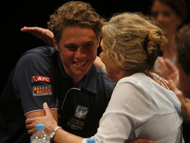 Charlie Curnow is embraced by his mum after learning he would join his brother Ed at Carlton. Picture: Simon Cross