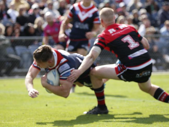 Hugh Prebble dives over for Camden. Picture Warren Gannon Photography