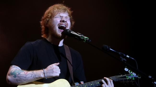 Guitar wizard ... Ed Sheeran will take on Australian stadiums all by himself in December. Picture Simon Cross.