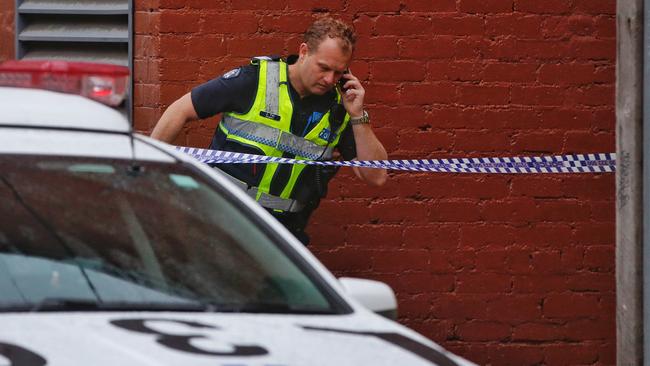 Neighbours say there is often a police presence in the laneway. Picture: Hamish Blair