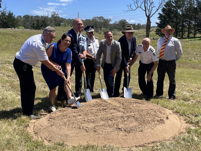 RFS members and politicians turning the sod at the facility site. Picture: Tom McGann