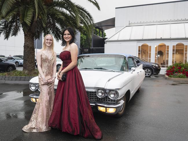 Tia Wallis (left) and Anna Rosinski arrive at Toowoomba Flexi School formal at Burke and Wills Hotel, Thursday, October 10, 2024. Picture: Kevin Farmer