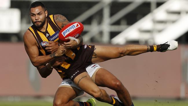 Jarman Impey is tackled by Shane McAdam. Picture: Getty Images