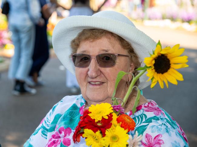 With fresh flowers from the markets is Yvonne Gisler in the Botanic Gardens, Queens Park during the Carnival of Flowers, Sunday September 22, 2024. Picture: Bev Lacey