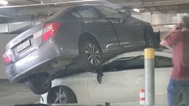 A Mercedes owner’s carpark mishap has blown up online after footage of their luxury sedan perched atop another car made waves on TikTok. @Kelzkitch