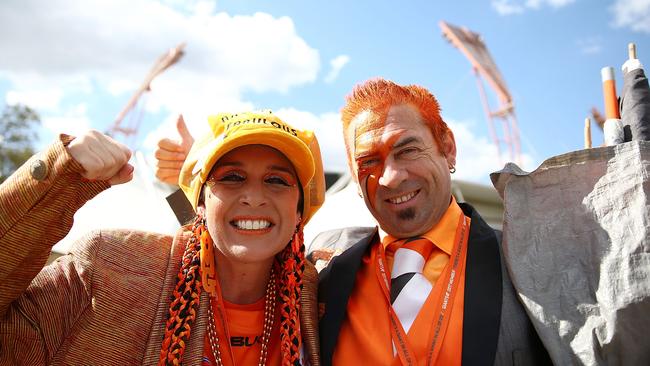 Loyal Giants fans Kath and Seb Dell’Orefice from Hammondville plan on being at every game this year to cheer their team on. Picture Mark Metcalfe/Getty Images