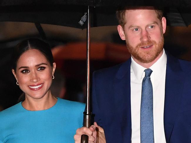 (FILES) In this file photo taken on March 5, 2020 Britain's Prince Harry, Duke of Sussex (R) and Meghan, Duchess of Sussex arrive to attend the Endeavour Fund Awards at Mansion House in London. - Prince Harry and Meghan Markle filed a lawsuit July 23 in Los Angeles against one or more paparazzi whom they accuse of taking pictures of their son without permission, their lawyer told AFP. (Photo by DANIEL LEAL-OLIVAS / AFP)