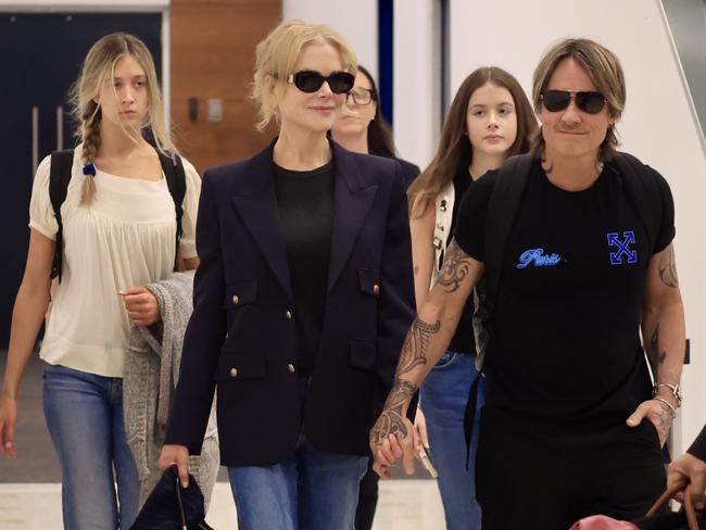 Nicole Kidman and Keith Urban arrive in Australia with their two daughters, Sunday and Faith. Picture: Media Mode