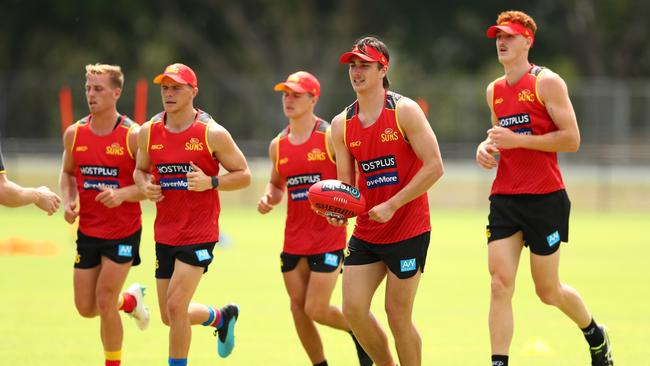 Sam Fletcher handballs during a Gold Coast Suns AFL media and training session at Metricon Stadium on November 04, 2019 in Gold Coast, Australia. (Photo by Chris Hyde/Getty Images)