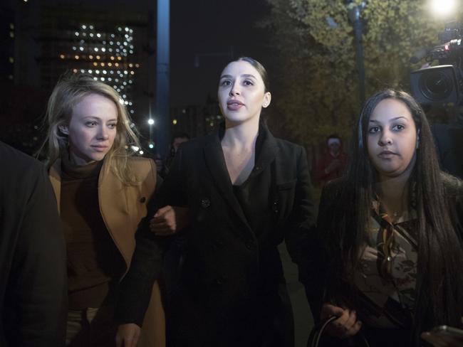 Emma Coronel, centre, the wife of Joaquin “El Chapo” Guzman leaves court after opening arguments in the trial of the Mexican drug lord. Picture: AP