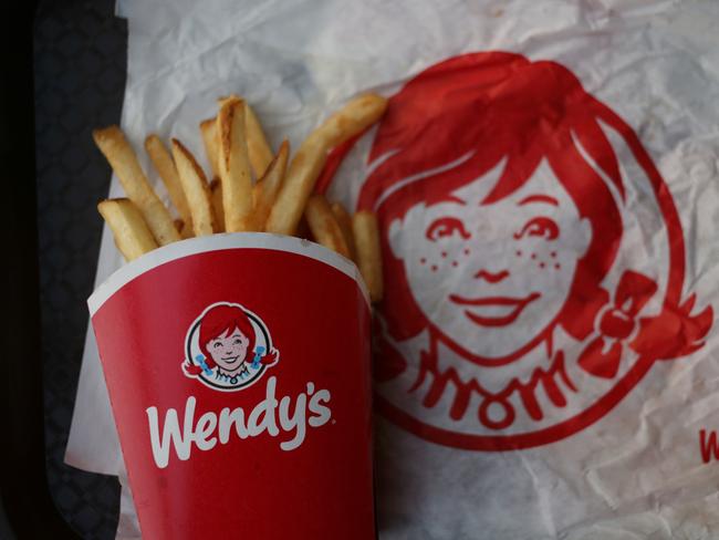 Wendy's Co. french fries are arranged for a photograph at a restaurant location in Mt. Vernon, Illinois, U.S., on Wednesday, July 29, 2015. Wendy's Co. is scheduled to release quarterly earnings on August 5. Photographer: Luke Sharrett/Bloomberg via Getty Images