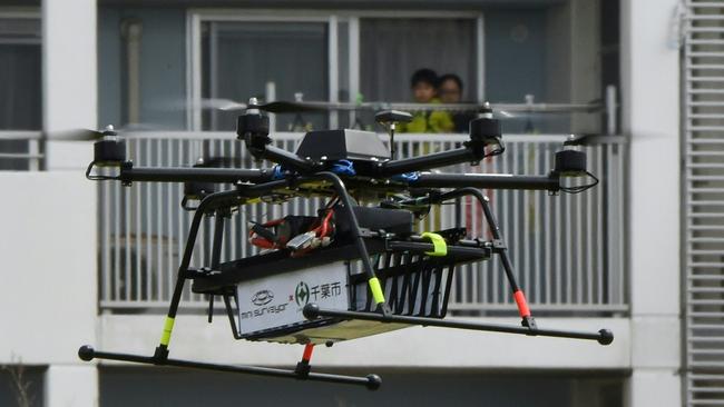 A Japanese drone being tested in Tokyo this week demonstrated door-to-door parcel delivery by a GPS-equipped drone. Picture: AFP