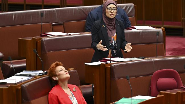 CANBERRA, AUSTRALIA - NewsWire Photos - November 27, 2024:  Senator Pauline Hanson and Senator Fatima Payman in the Senate at Parliament House in Canberra. Picture: NewsWire / Martin Ollman