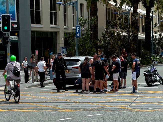 Emergency services called to motorbike and car crash in Surfers Paradise. Photo: Mike Ford