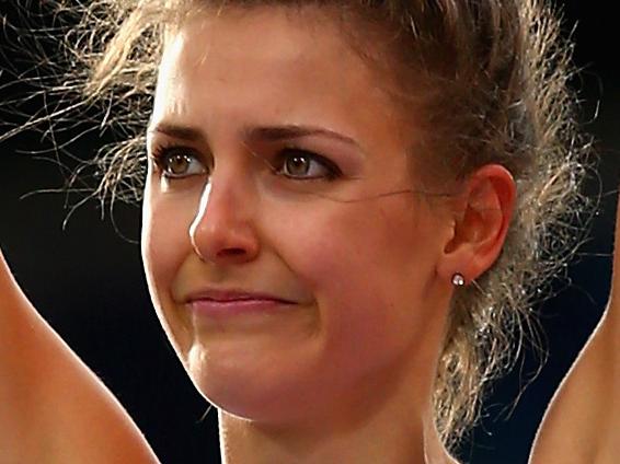 GLASGOW, SCOTLAND - AUGUST 01: Isobel Pooley of England celebrates winning silver in the Women's High Jump final at Hampden Park during day nine of the Glasgow 2014 Commonwealth Games on August 1, 2014 in Glasgow, United Kingdom. (Photo by Cameron Spencer/Getty Images)