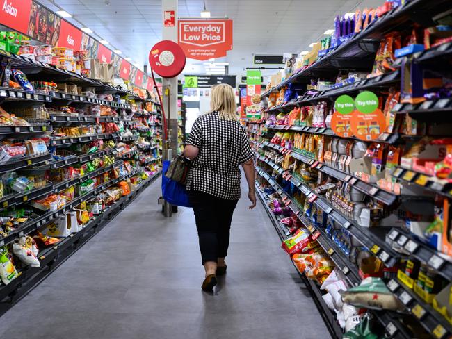 SYDNEY, AUSTRALIA - SEPTEMBER 05: An aisle of products in a Woolworths Supermarket on September 05, 2024 in Sydney, Australia. Australia is currently facing a severe cost of living crisis, with rising prices for essentials like food, housing, and utilities significantly outpacing wage growth, leaving many households struggling to make ends meet. While over 3.3 million Australians live in poverty, supermarket giants and banks are reporting record profits, highlighting a stark contrast between corporate gains and the financial hardship experienced by everyday citizens. This situation poses serious challenges across the nation, as people navigate the pressures of high inflation and inadequate support. (Photo by James Gourley/Getty Images)