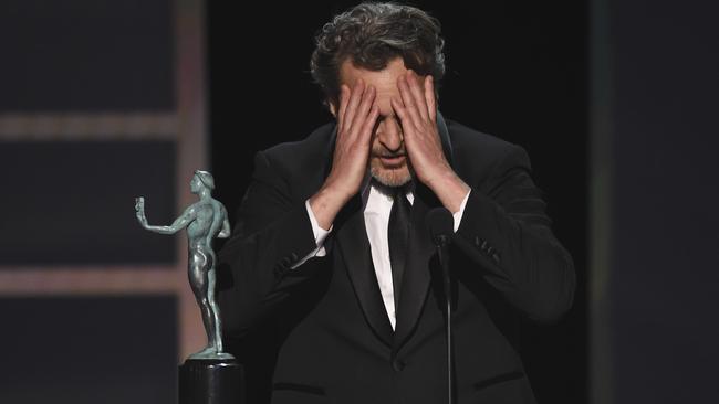 Joaquin Phoenix accepting his SAG award.