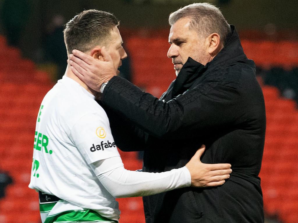 Celtic manager Ange Postecoglou and captain Callum McGregor after winning the title at Dundee. Picture: Ross Parker/SNS Group via Getty Images