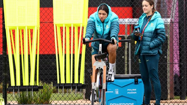 Sam Kerr of Australia uses an exercise bike during Sunday’s training session Picture: Getty Images