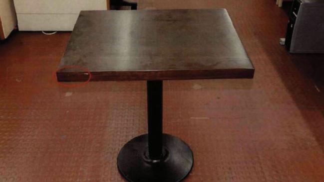 A table from the Lindt cafe with damage from gunfire. Picture: NSW Police