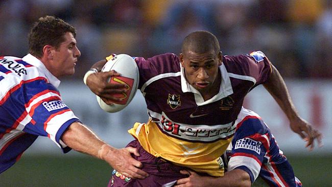 Lote Tuqiri in action for the Broncos.