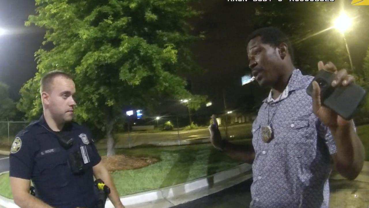 Bodycam footage shows Rayshard Brooks speaking with Officer Garrett Rolfe. Picture: Atlanta Police Department via AP