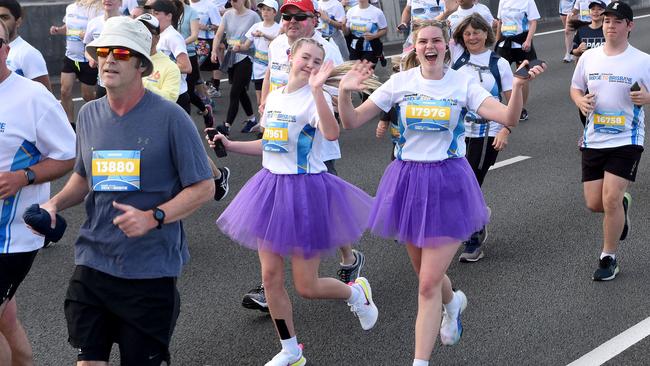 Runners and Walkers coming down the bridge for the Bridge 2 Brisbane fun run. Sunday August 28, 2022. Picture, John Gass