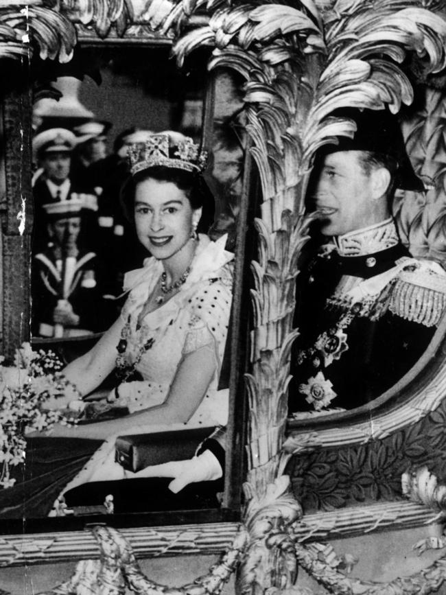 The Queen and Prince Philip travelled to Westminster Abbey in the Gold State Coach. He was in full-dress Naval uniform and she wore a satin dress by famed designer Norman Hartnell together with the George IV State Diadem, which boasts 1333 diamonds and 169 pearls.