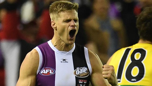 Nick Riewoldt of the Saints (left) reacts after kicking a goal during the Round 16 AFL match between the St.Kilda Saints and the Richmond Tigers at Etihad Stadium in Melbourne, Saturday, July 8, 2017. (AAP Image/Julian Smith) NO ARCHIVING, EDITORIAL USE ONLY