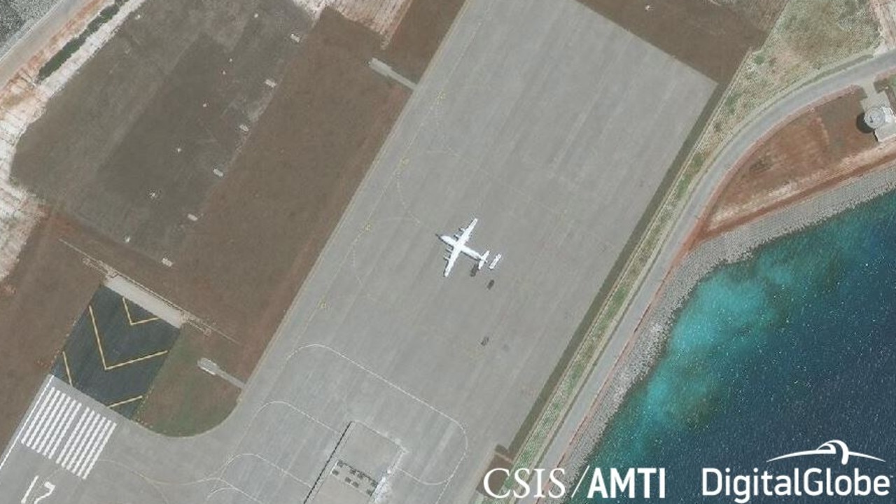 A Shaanxi Y-8 military aircraft at the airstrip on Subi Reef, April 28, 2018. Source: CSIS/AMTI