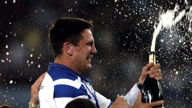 03/10/04 Telstra Cup 2004 at Telstra Stadium Homebush Grand Final 2004 Sydney City Roosters Vs Canterbury Bulldogs Steve Price celebrates the victory Bulldogs win 16-13 Brad Fitler retires without the fairytale ending Pics by Craig Wilson