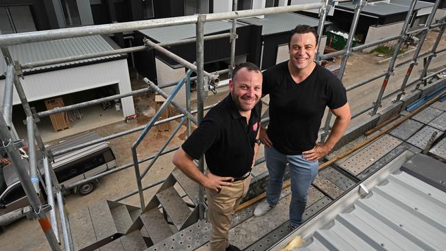 L-R Brendan Tutt , managing director of Tessa Group and Kurt Swenson, director of Tessa Group, at their new townhome development under construction in Arana Hills in Brisbane's north. Picture: Lyndon Mechielsen.