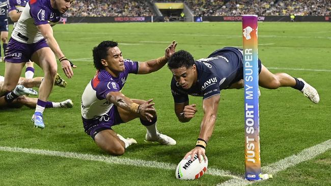 Murray Taulagi scores a try against Melbourne. (Photo by Ian Hitchcock/Getty Images)