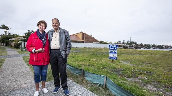 Gina and Lou Christeson at a block of land in Lae Drive Runaway Bay). They live nearby and often walk past this block of land. Picture: Mark Cranitch.