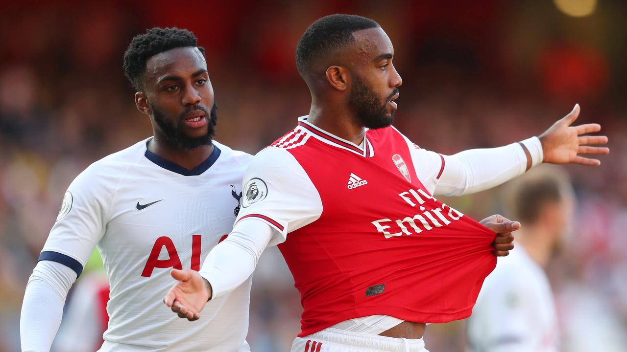Alexandre Lacazette of Arsenal (R) will miss three matches. (Photo by Catherine Ivill/Getty Images)
