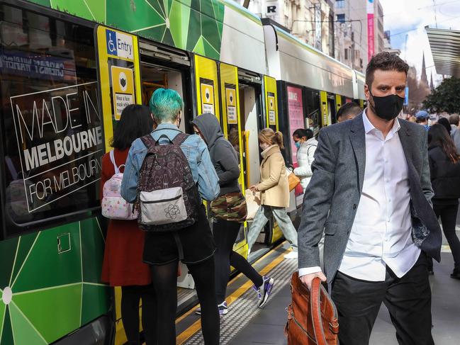 Commuters face fines up to $3600 for failing to wear a mask on public transport. Picture: Ian Currie