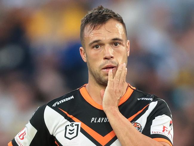 SYDNEY, AUSTRALIA - APRIL 10:  Luke Brooks of the Wests Tigers looks dejected during the round six NRL match between Wests Tigers and Parramatta Eels at Accor Stadium on April 10, 2023 in Sydney, Australia. (Photo by Mark Metcalfe/Getty Images)