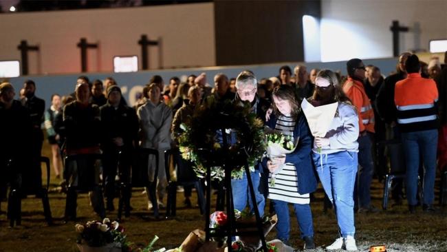 Mourners shared stories and left flowers to honour the loved ones they lost in the Hunter Valley bus crash. Photo: NCA NewsWire / Jeremy Piper