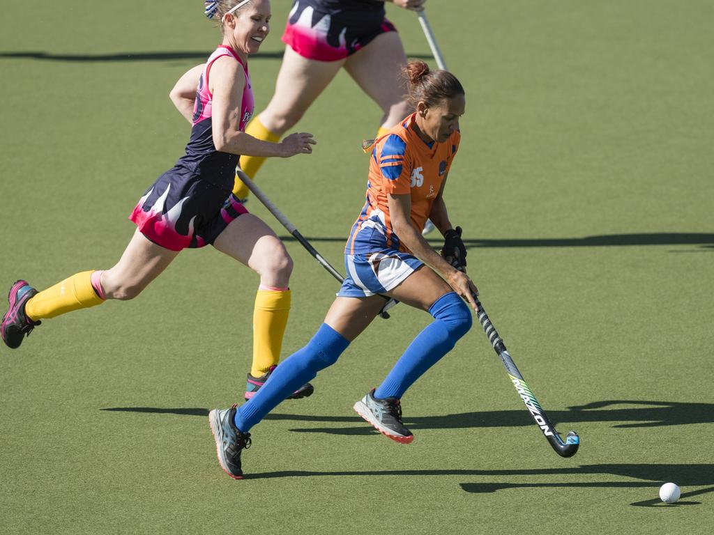 Naomi Smith of Maryborough 1 under pressure from Latitia Robinson of Toowoomba 2.