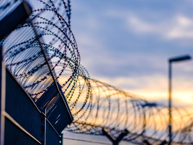 barbed razor wire jail prison istock